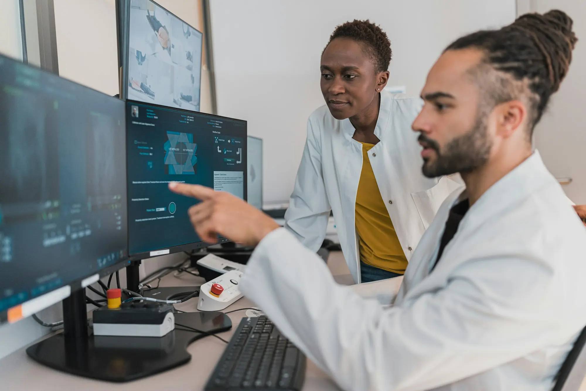 Clinicians reviewing a case in a modern practice